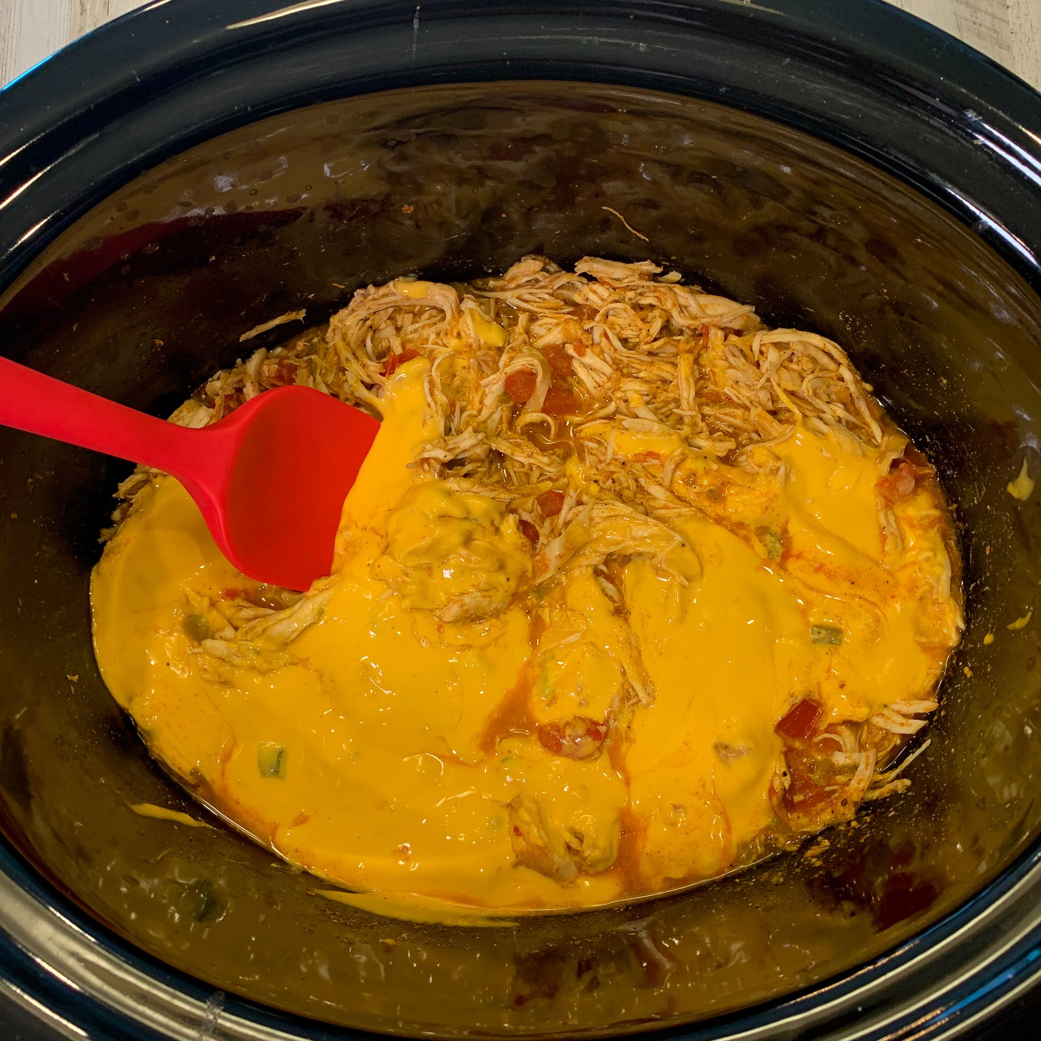 Slow Cooker Queso Chicken Tacos