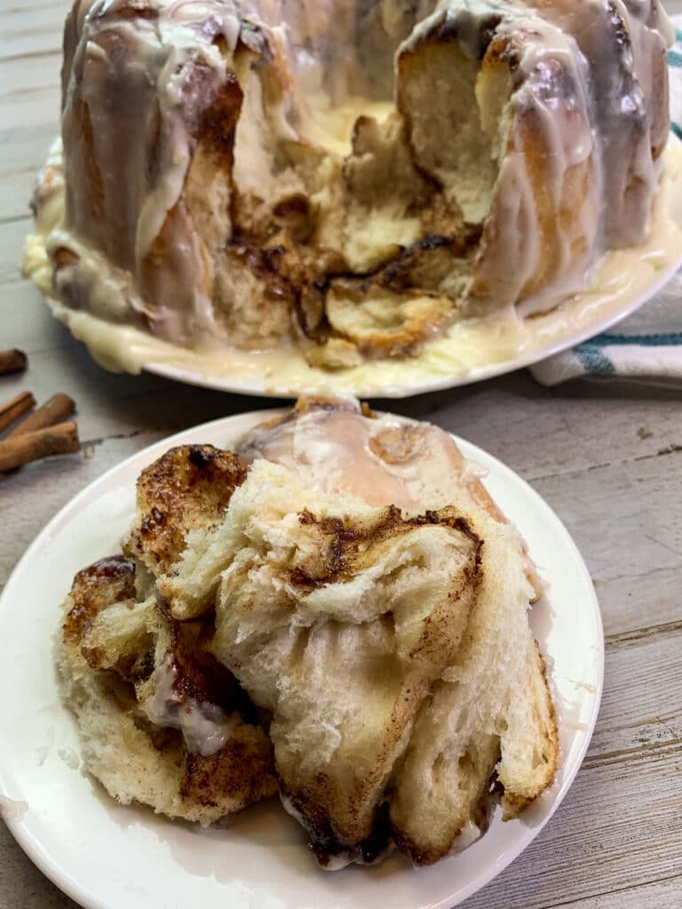 Close up of monkey bread so you can see the cinnamon swirl in the middle.