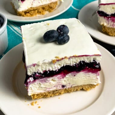 Close up of no-bake blueberry cheesecake bars.