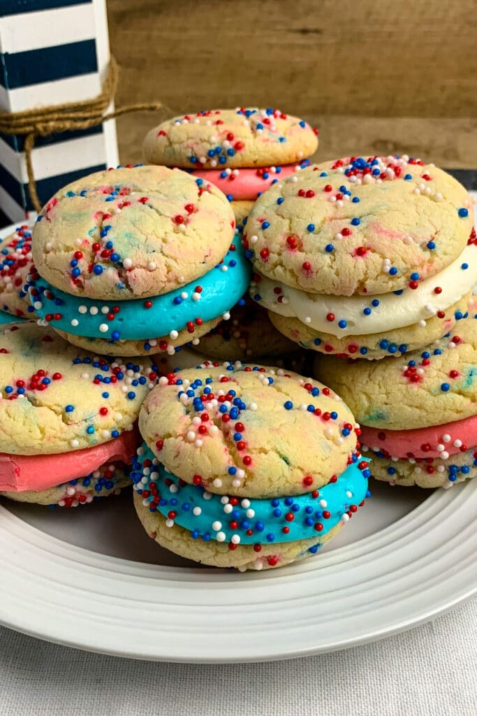4th of July cake mix cookies on a white plate.