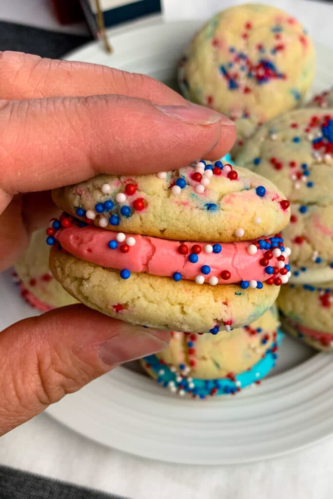 Close up of a cake mix cookie being held in a hand.