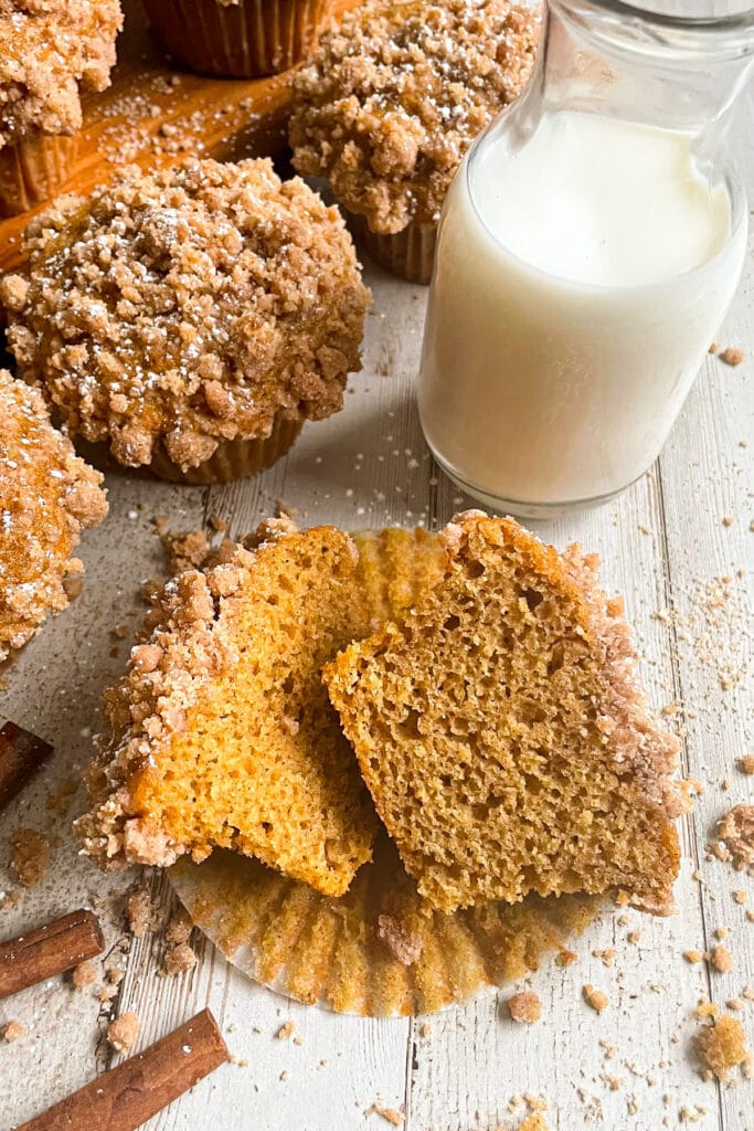 Pumpkin Muffin Cut in half and served with a glass of milk