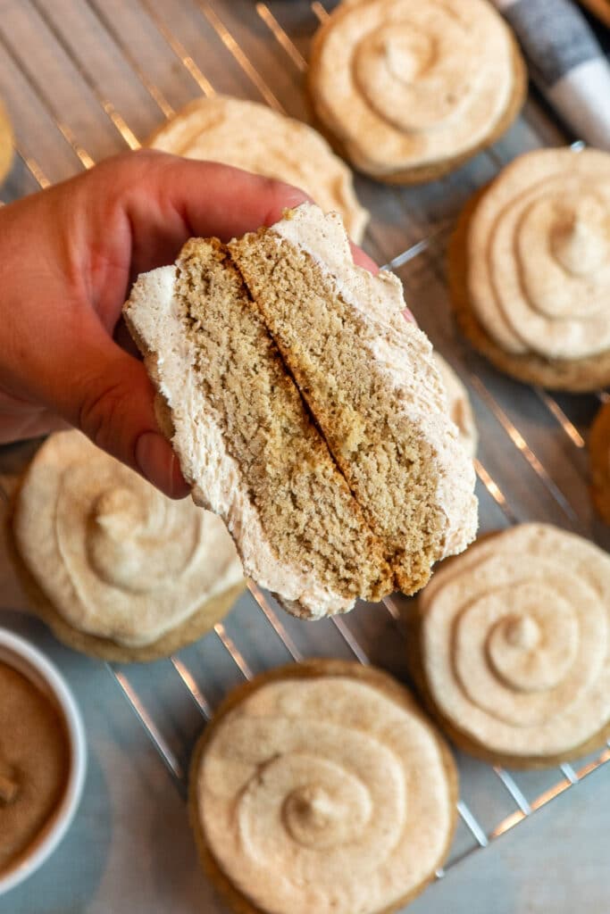 Baked churro cookie cut in half to show how thick it is.