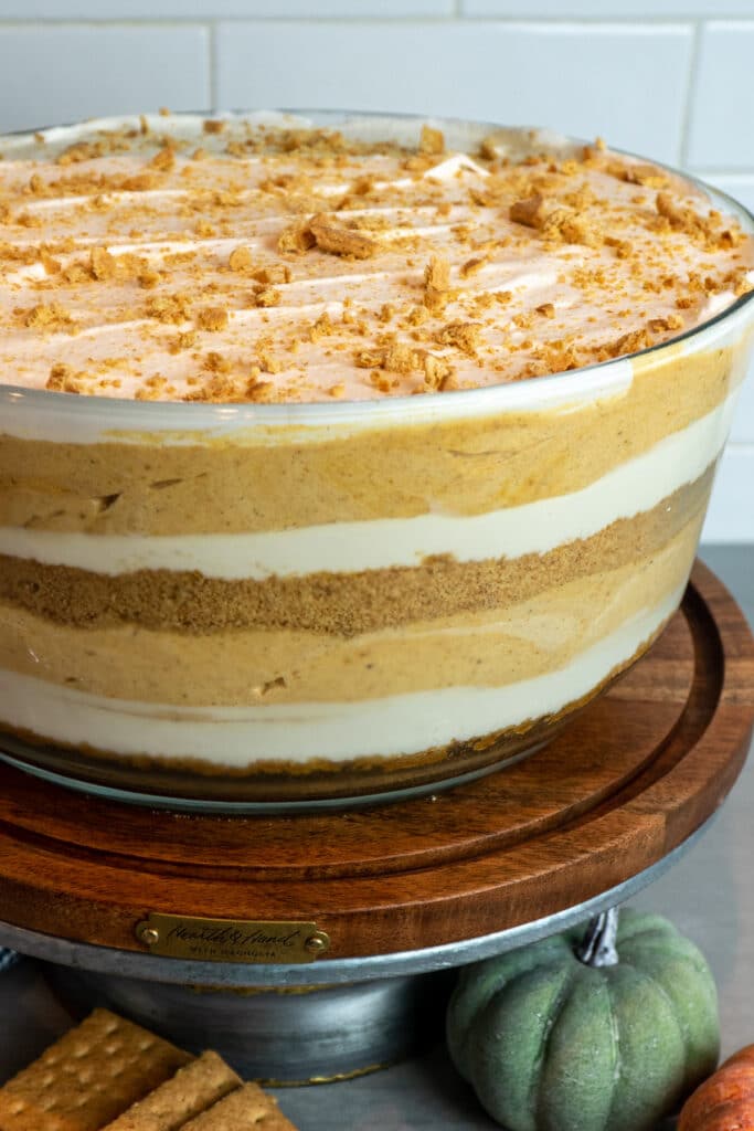 Pumpkin trifle in a glass trifle bowl.