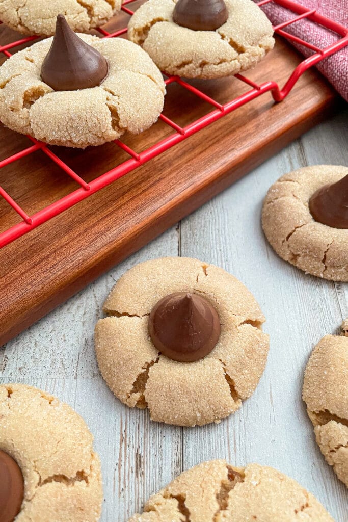 peanut butter blossom cookies cooling on a cooling rack