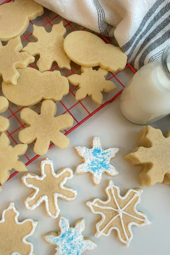 Sugar cookies decorated with frosting and sprinkles