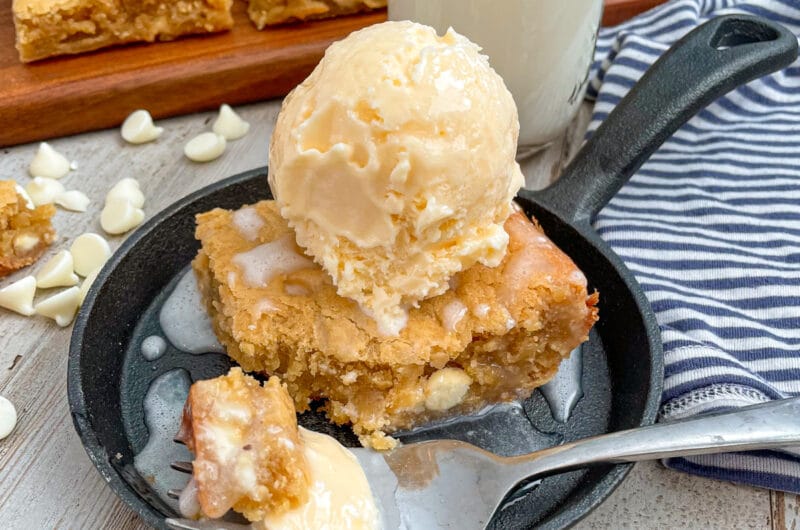 the best white chocolate chop blondie recipe served with cold ice cream and vanilla sauce