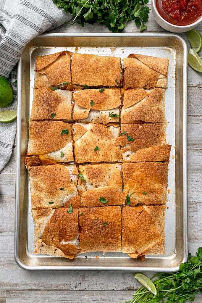 baked ground beef quesadillas cut into individual square.