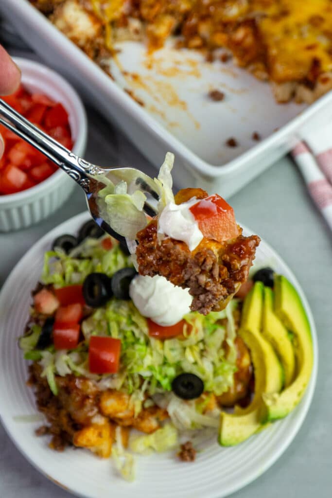 Mexican bubble casserole on a fork to show off the inside.