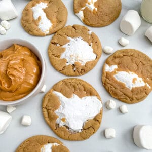 fluffernutter cookies with marshmallows and a bowl of peanut butter