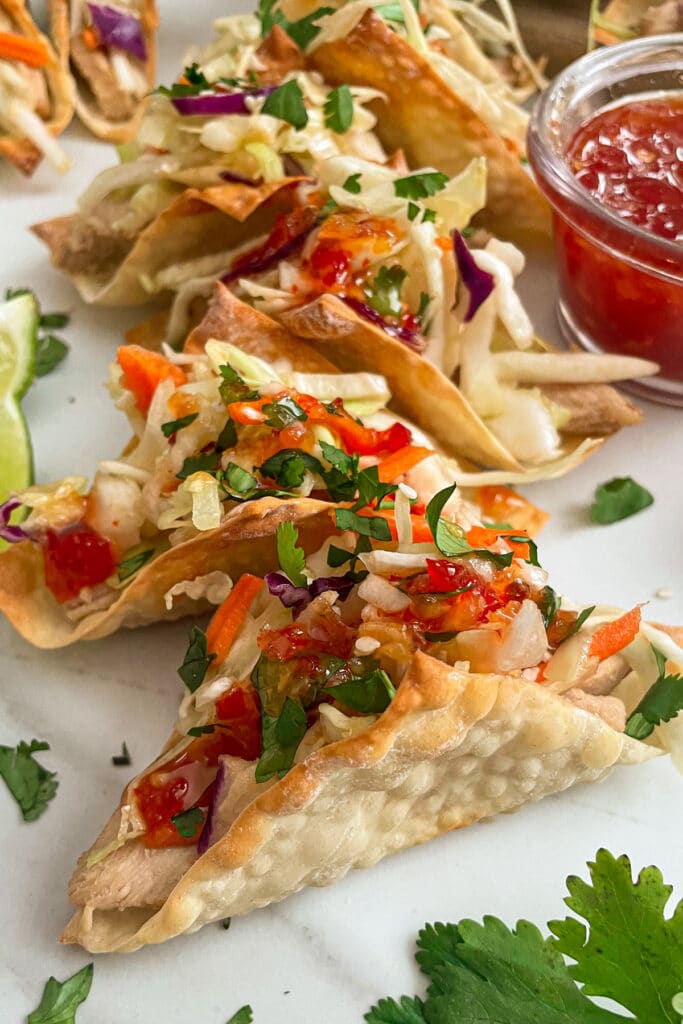 baked Applebee's crispy wonton tacos topped with sweet chili sauce