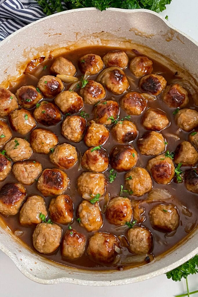 salisbury steak meatballs in a large skillet