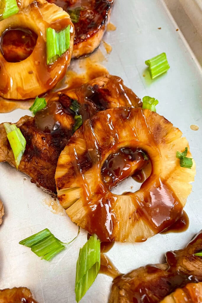 Easy grilled Hawaiian pork chops with chopped green onions
