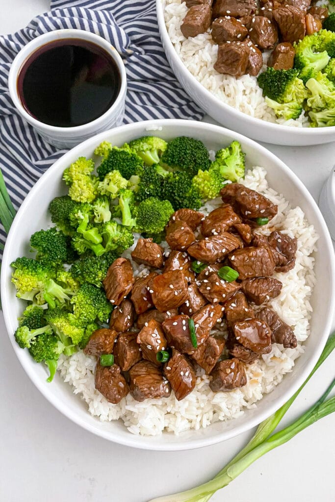 The best teriyaki steak bites served with broccoli and white rice