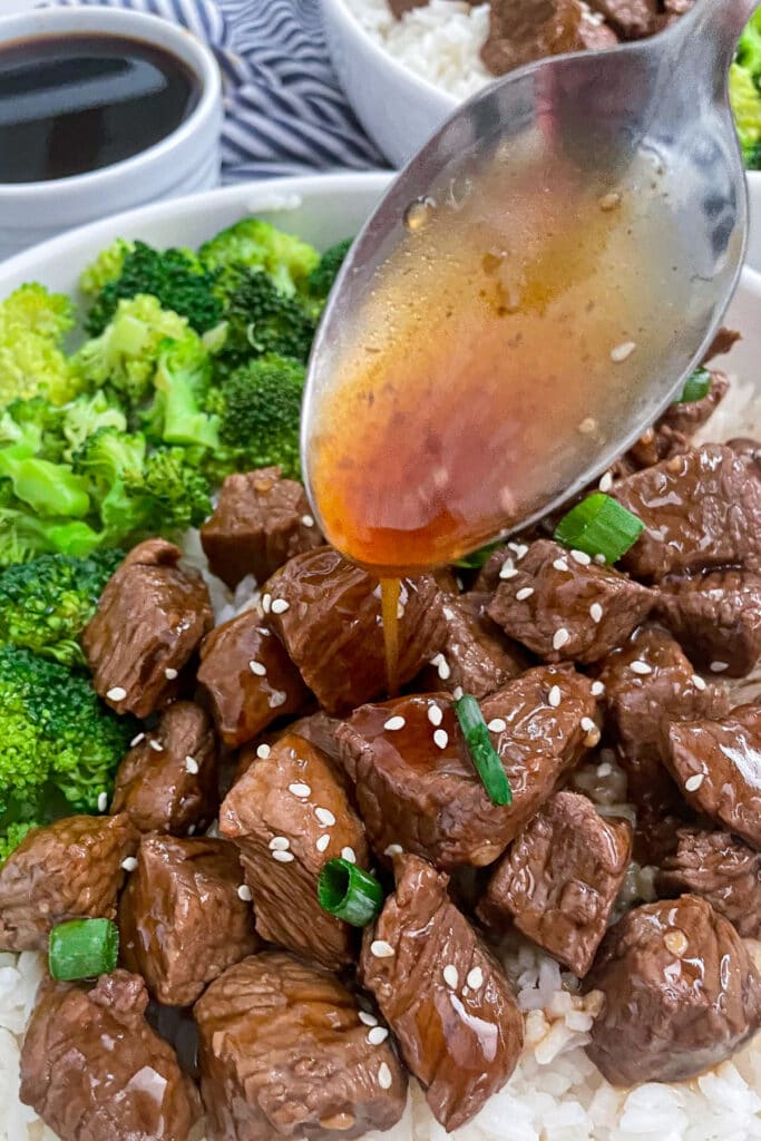 close up shot of teriyaki steak bites with teriyaki glaze