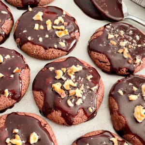 texas sheet cake cookies with a spoon of chocolate frosting
