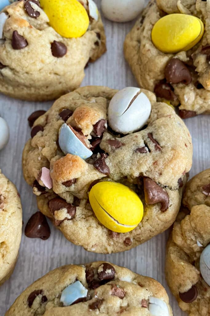 close up shot of Cadbury egg cookies laid flat on a cookie board