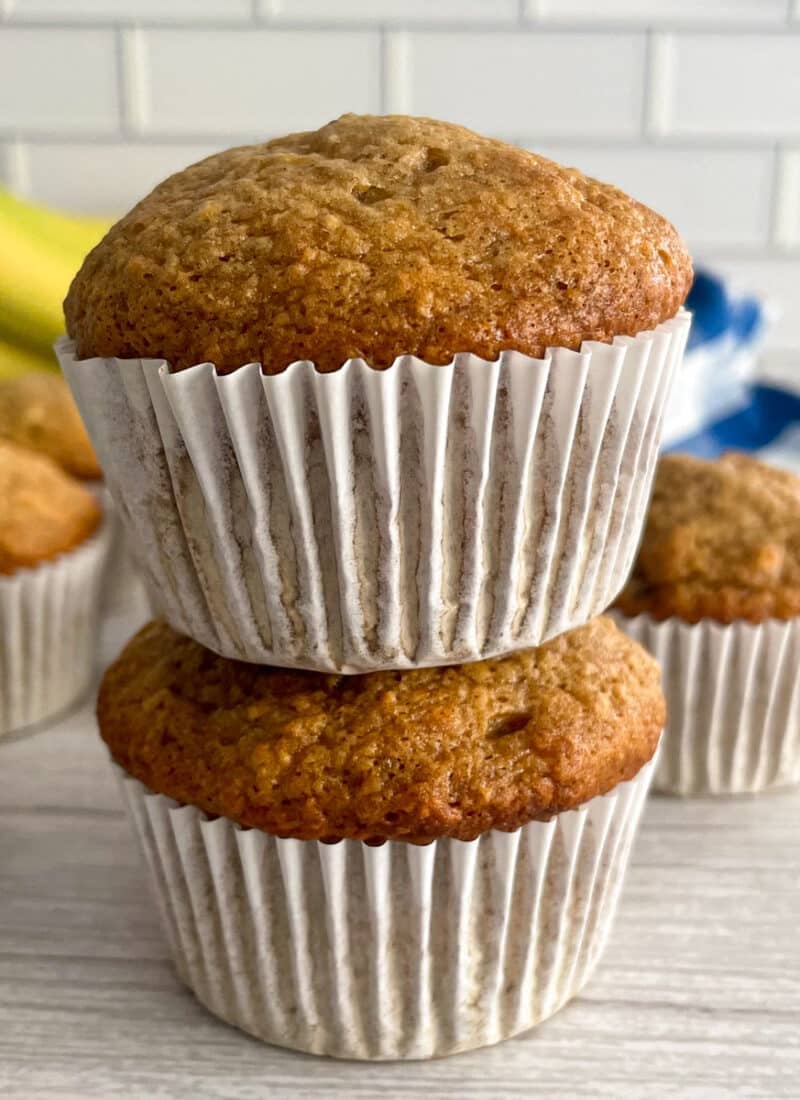 Easy banana muffins stacked on top of each other.