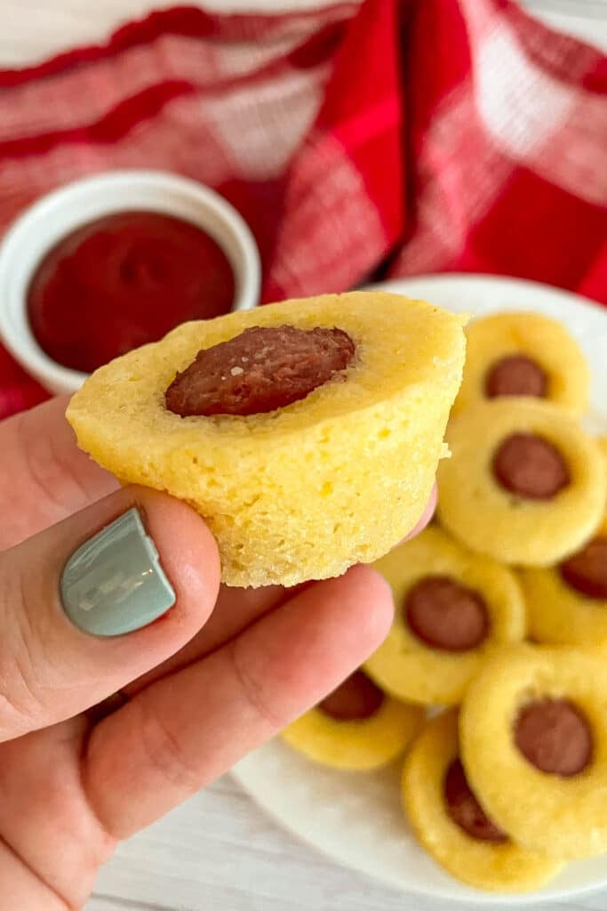 close up photo of one mini corn dog bite