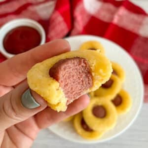 close up photo of one mini corn dog bite