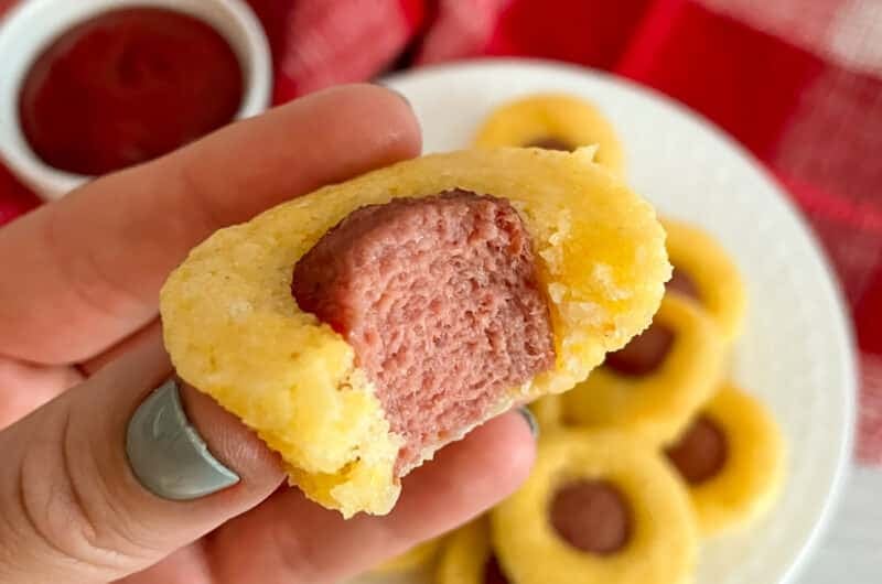 close up photo of one mini corn dog bite