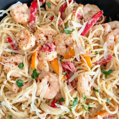 close up phot of Cajun shrimp pasta in a skillet for serving