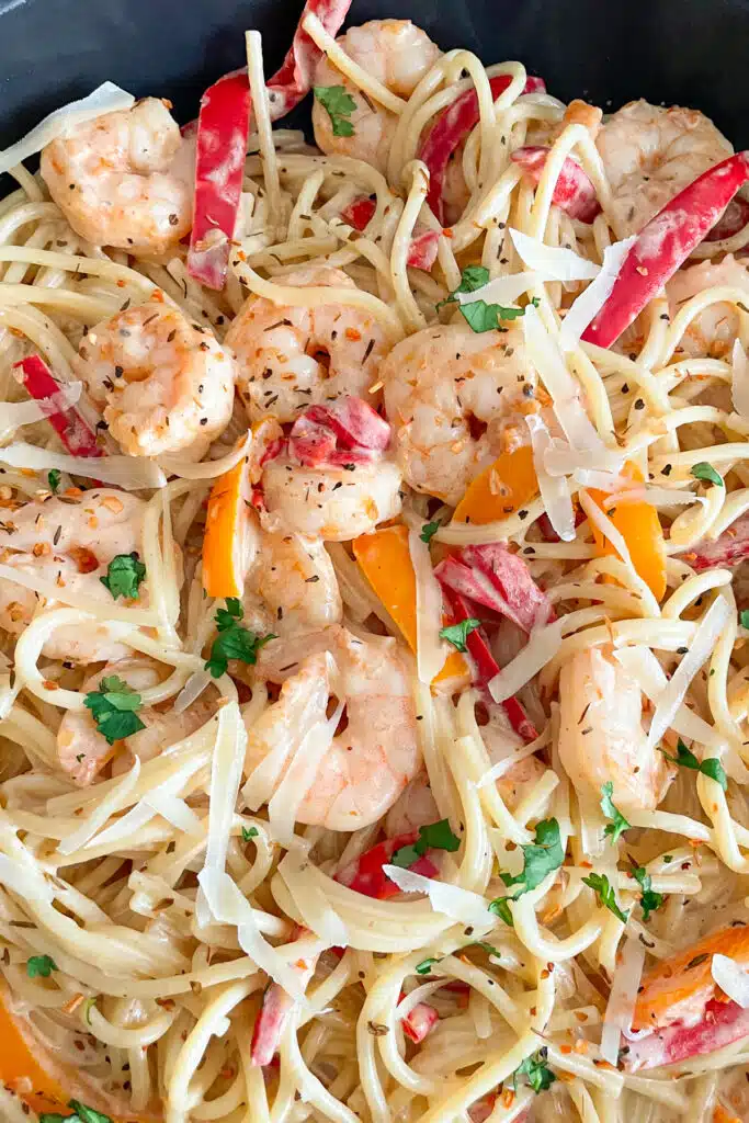 close up phot of Cajun shrimp pasta in a skillet for serving
